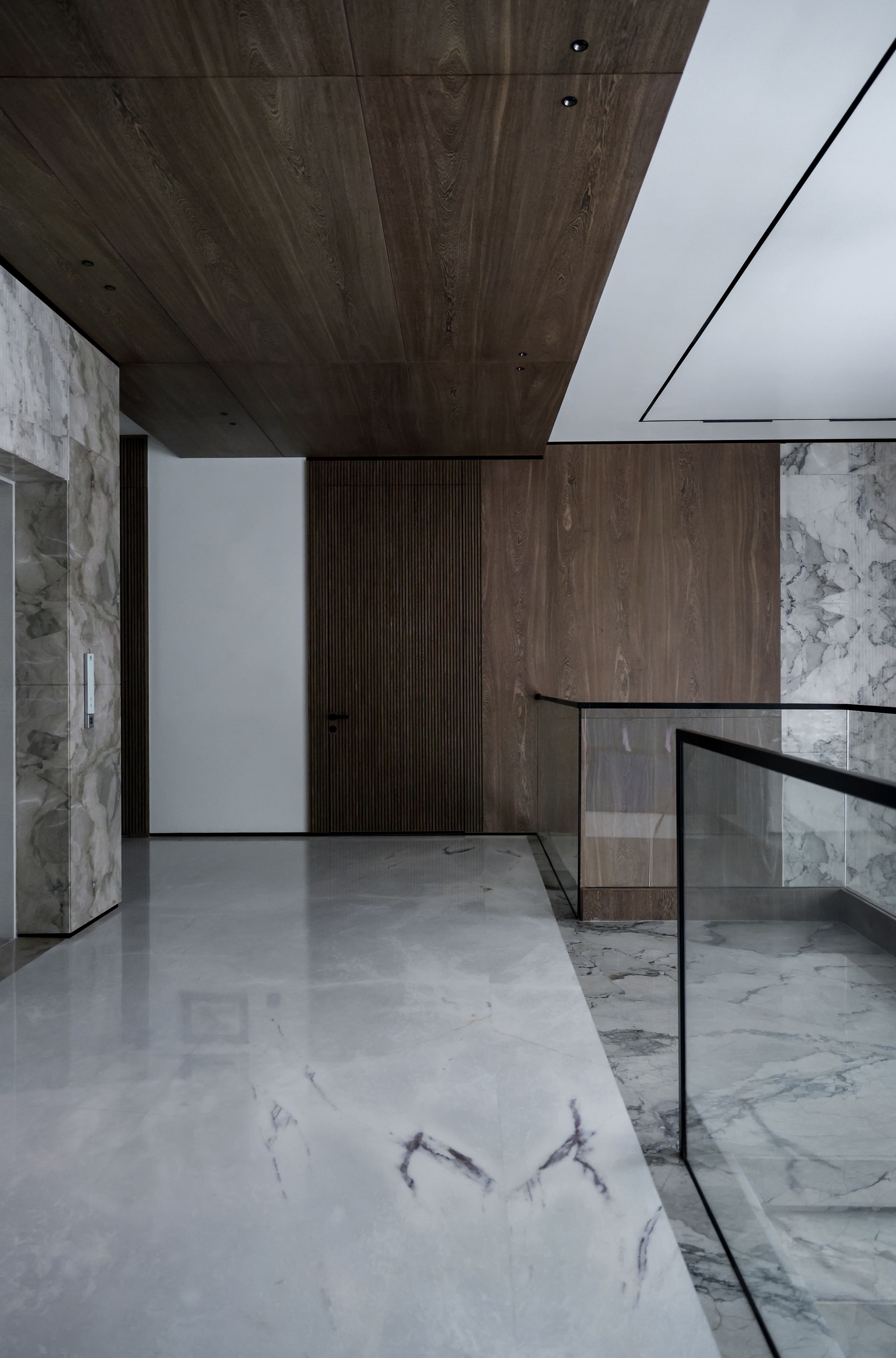 Refined contemporary interior with marble and wood details